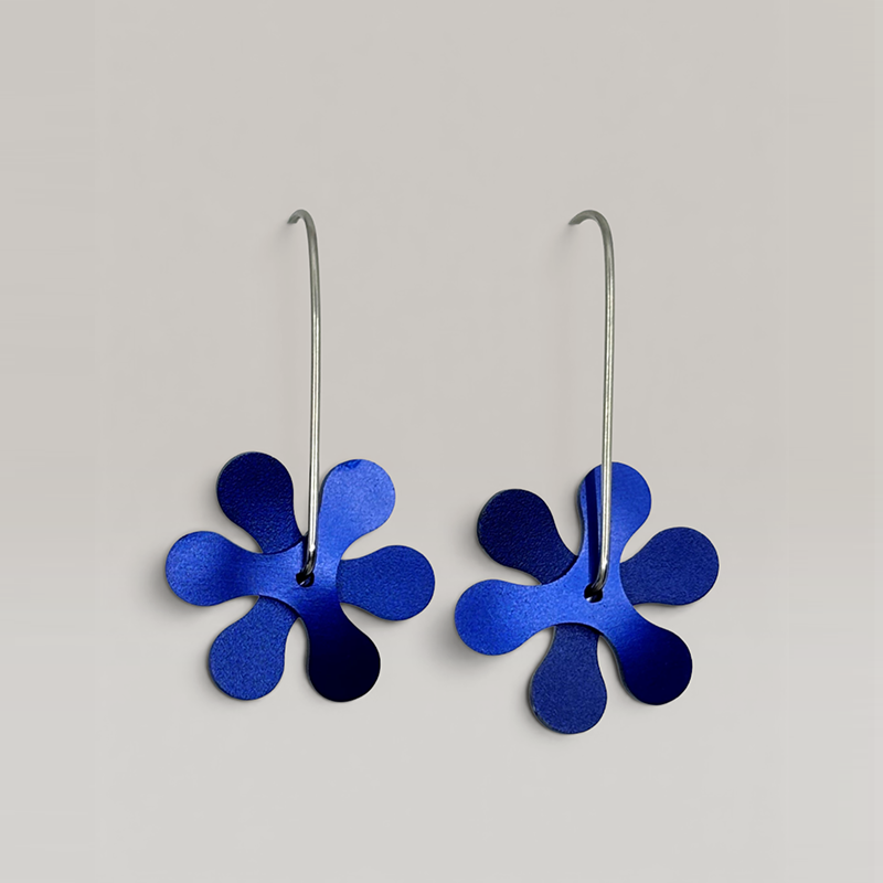 The Propellor Curve Earrings in Deep Blue