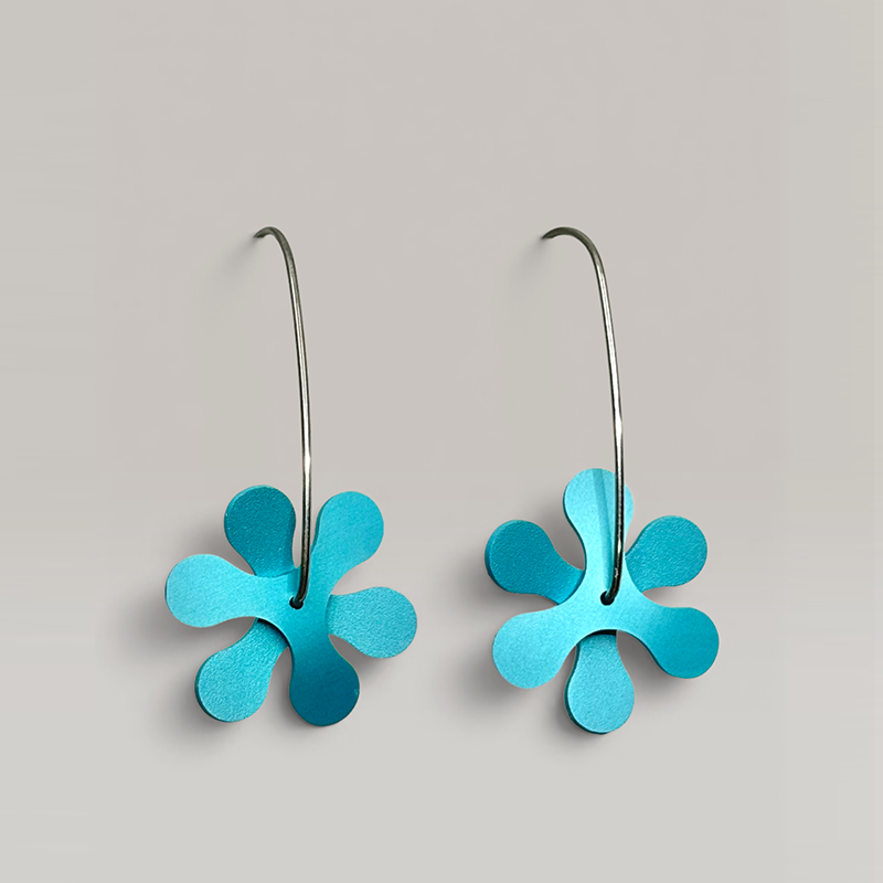 The Propellor Curve Earrings in Aqua