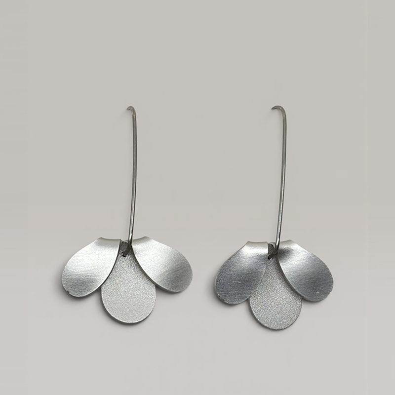 The Flip Curve Earrings in Silver